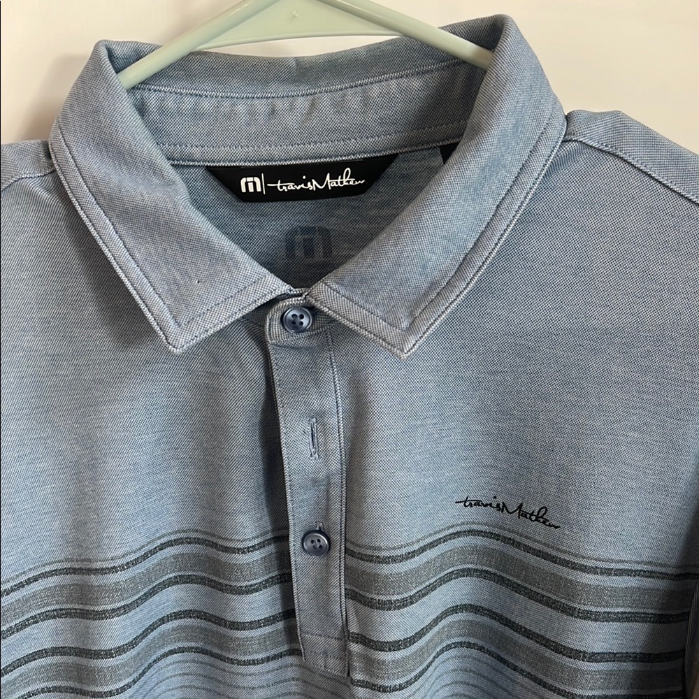 Travis Mathew Blue Polo Shirt with Stripes